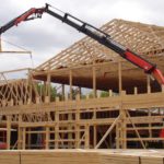 Strumento nuovo per gru caricatrici: sicurezza al primo posto sullo scarico di camion su pendenze